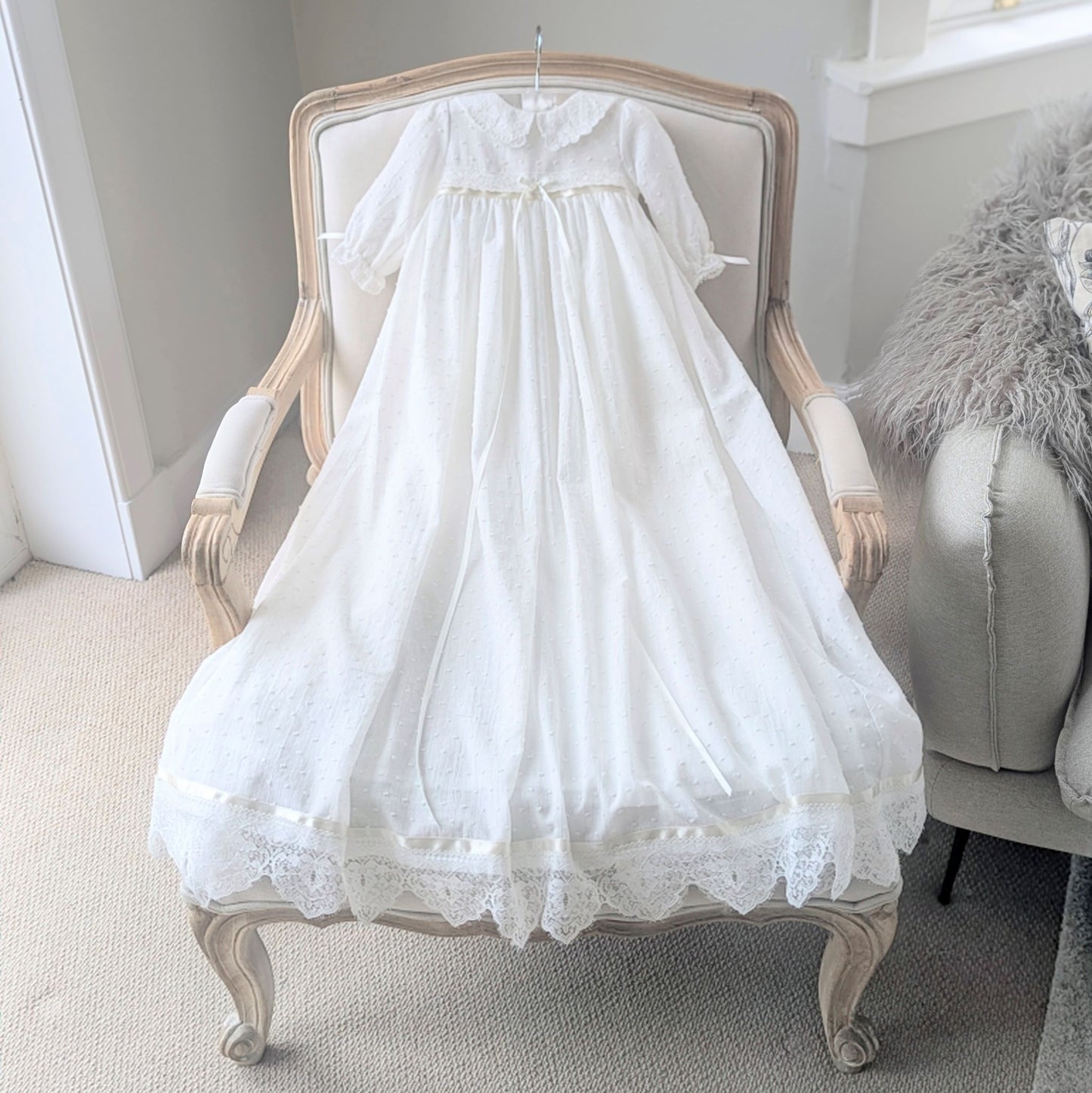Full-length front view of the Isabella Christening Gown by Mila and Moss, featuring ivory plumeti cotton and a traditional long silhouette