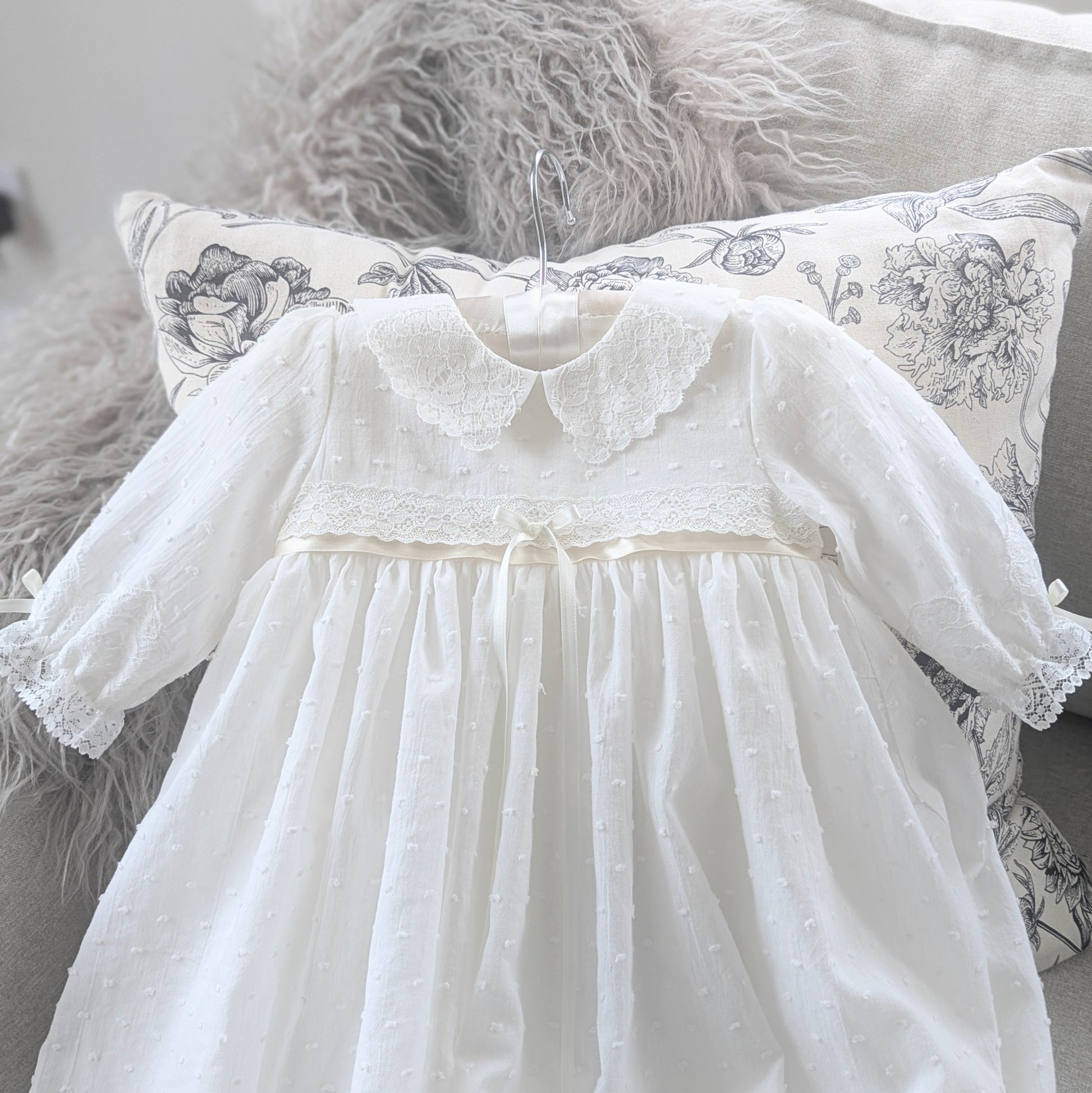 bodice detail of the Isabella christening gown with collar and lace trim