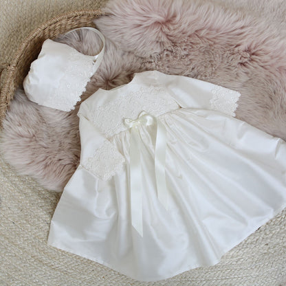 Lara dress and bonnet with long sleeves, shown with the matching Lucy bonnet