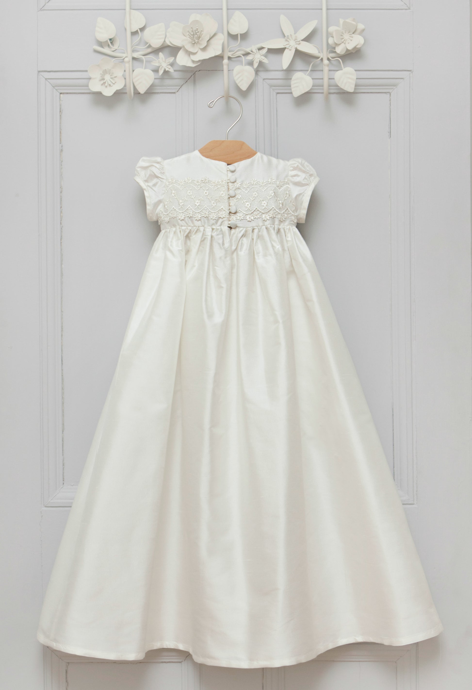 Lily christening gown showing the full length back detail including loops and buttons