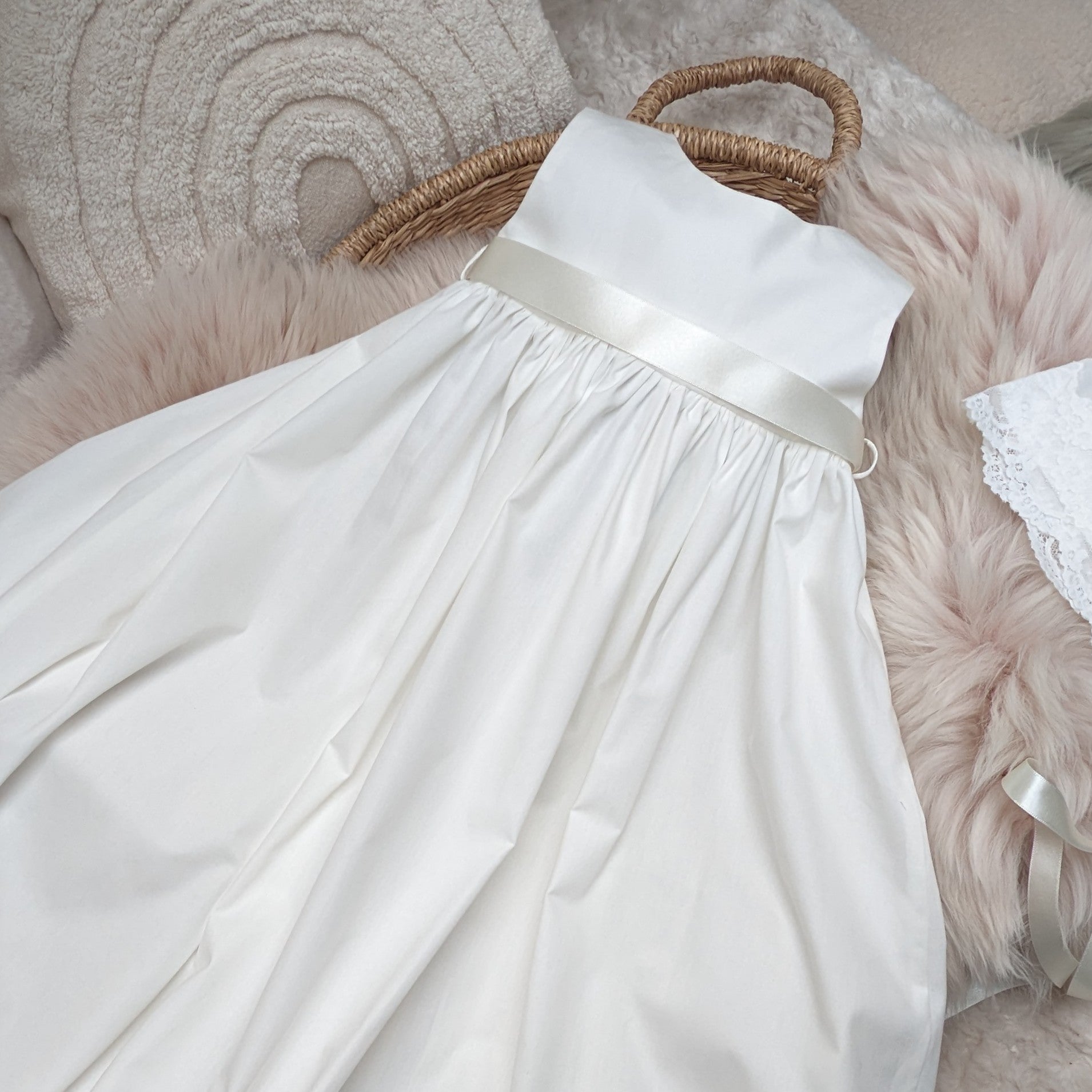 close up detail of Serenity Sleeveless cotton Christening gown, ribbon band

