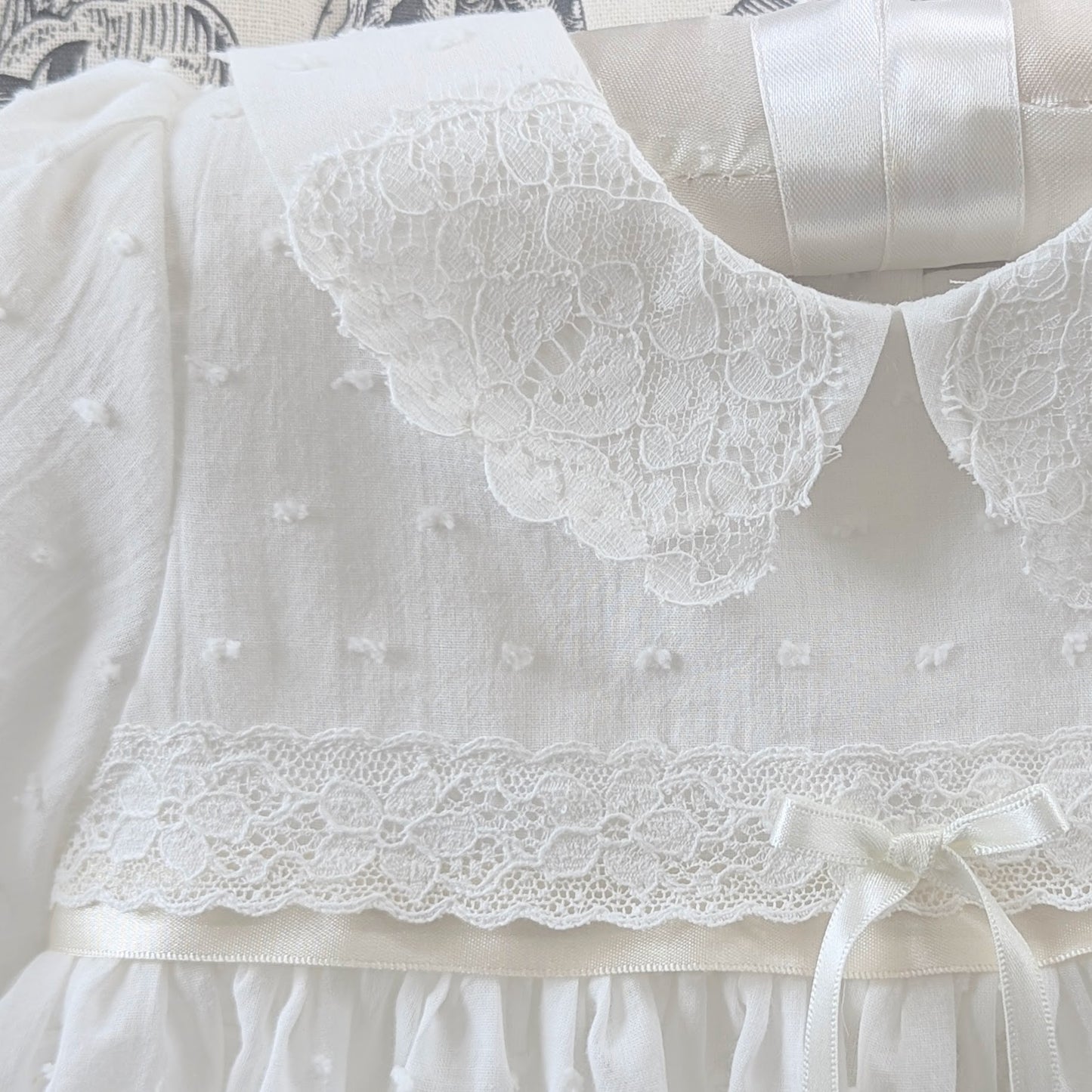 Intricate handmade couture details on the front bodice of the Mila and Moss Isabella gown.