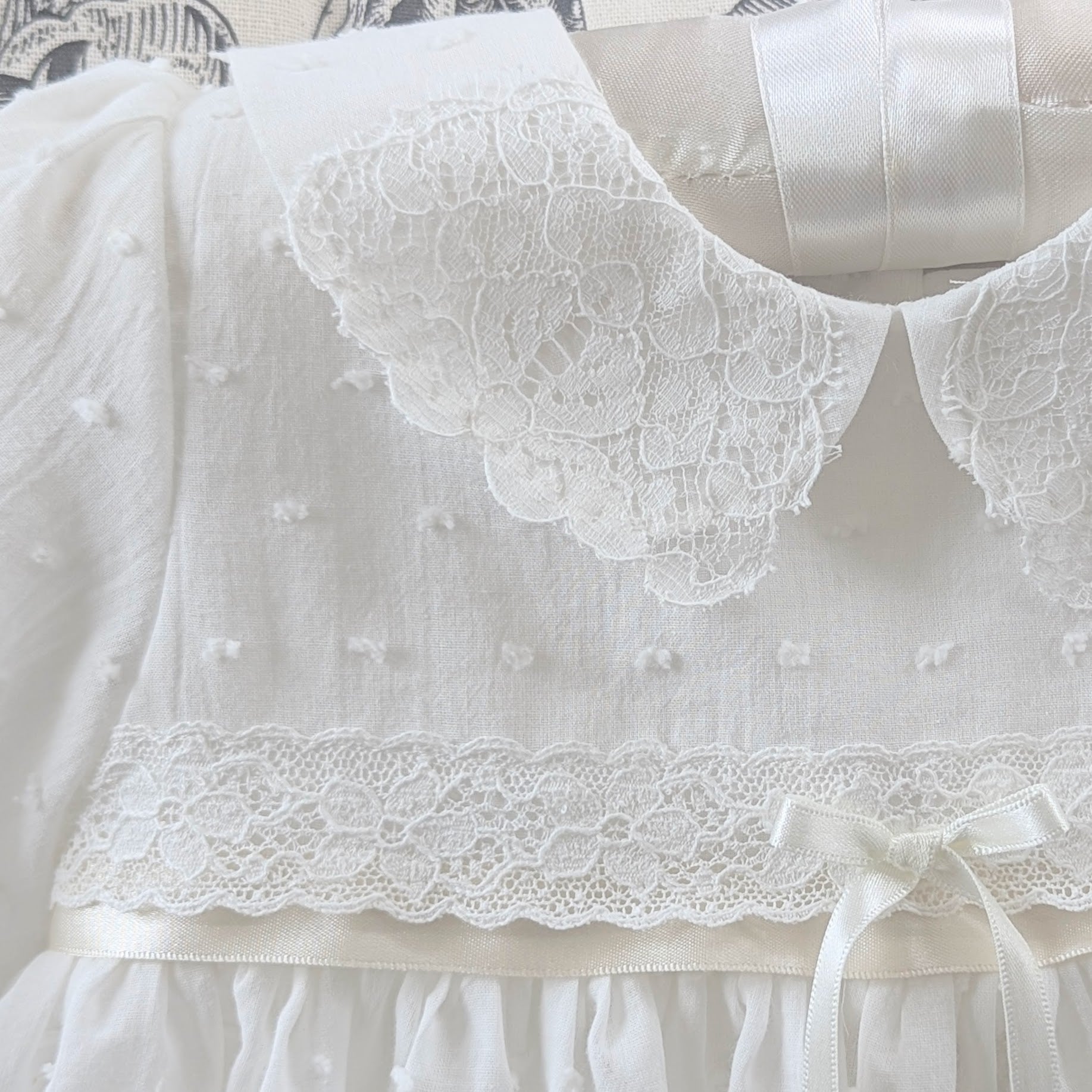 Intricate handmade couture details on the front bodice of the Mila and Moss Isabella gown.