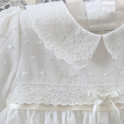 Intricate handmade couture details on the front bodice of the Mila and Moss Isabella gown.